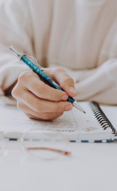 writing in notebook